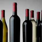 close-up-of-wine bottles over white background